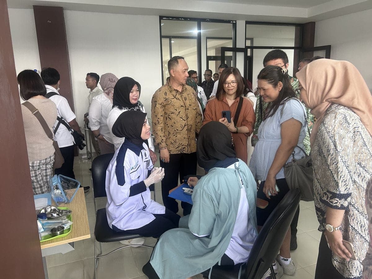 Officials watching caregivers during a practical session