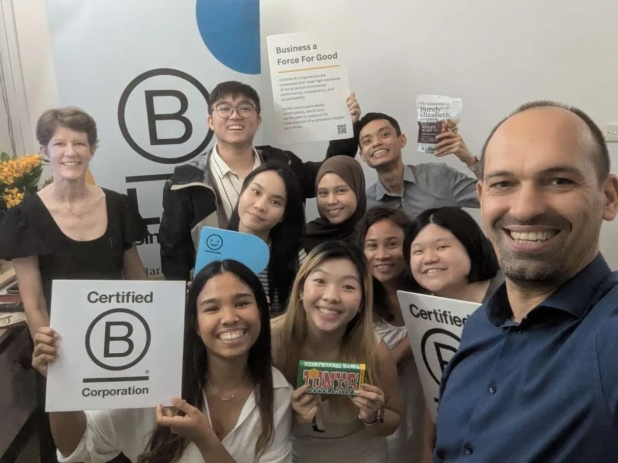 The team at a B Corp workshop in the office