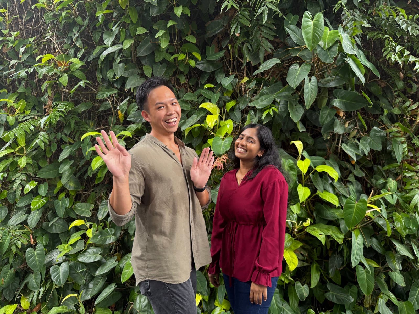 Brian and Sharukesi from the We Are Caring team, waving